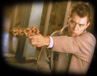 JUDE LAW plays TED PIKUL, a rookie security guard who links into Geller's world.