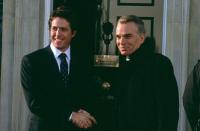Hugh Grant as The Prime Minister with 
Billy Bob Thornton as The US President