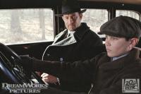Tom Hanks and Liam Aiken as 
Michael and Peter Sullivan