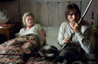 Gretchen Mol as Alice Evans and 
Christian Bale as Dan Evans